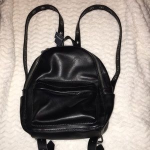 Mini black leather backpack